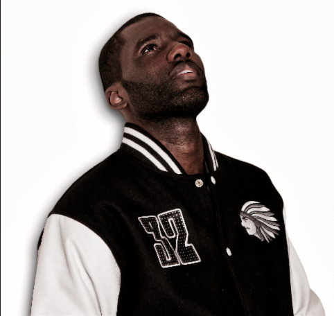 Musician on stage in a custom varsity jacket